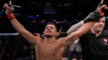  Rafael Dos Anjos of Brazil reacts after his victory over Renato Moicano of Brazil in their 160-pound catchweight fight during the UFC 272 event on March 05, 2022 in Las Vegas, Nevada. (Photo by Jeff Bottari/Zuffa LLC)